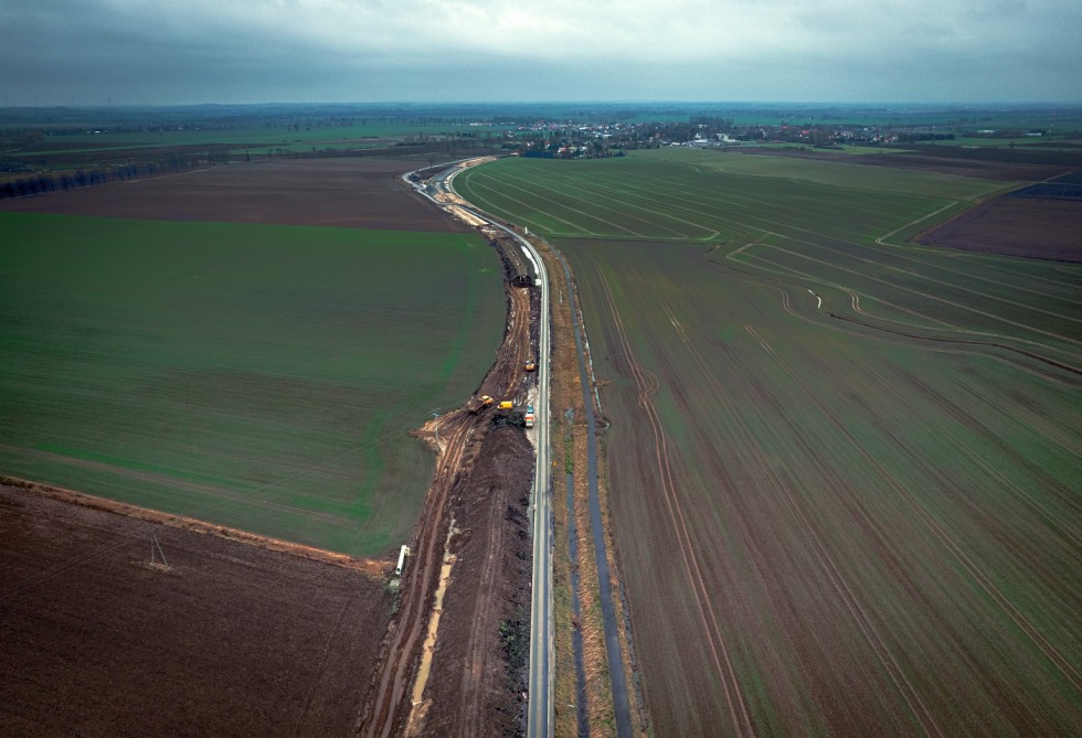 Intensywne prace przy rozbudowie DK22. Spółki z Grupy NDI przebudowują ponad 10-kilometrowy odcinek od Królewa Malborskiego do granicy województw pomorskiego i warmińsko-mazurskiego. Zobacz wideo i zdjęcia grudzień 2023.