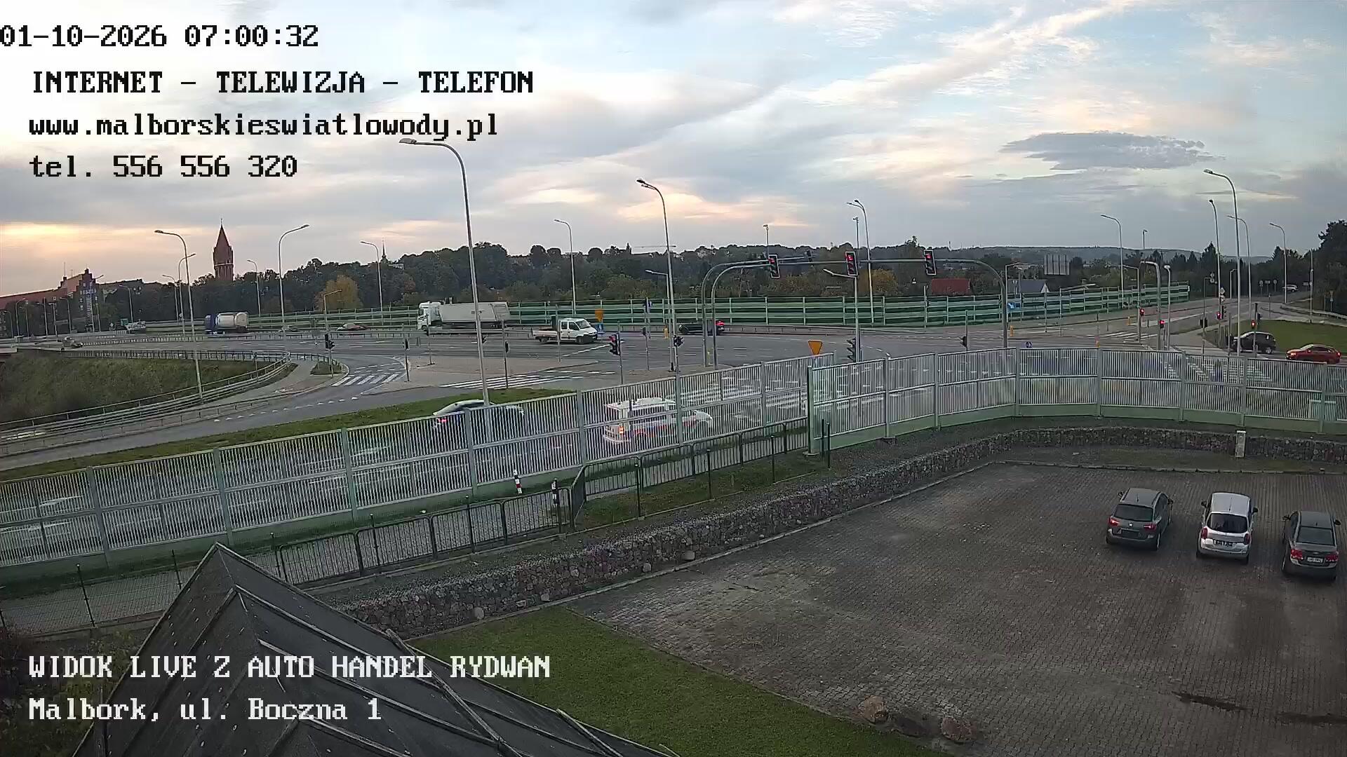 Podgląd: Widok live z Auto Handel Rydwan. Wjazd na mosty. Malbork, ul. Wałowa-Boczna. Skrzyżowanie dróg krajowych nr 22 i 55